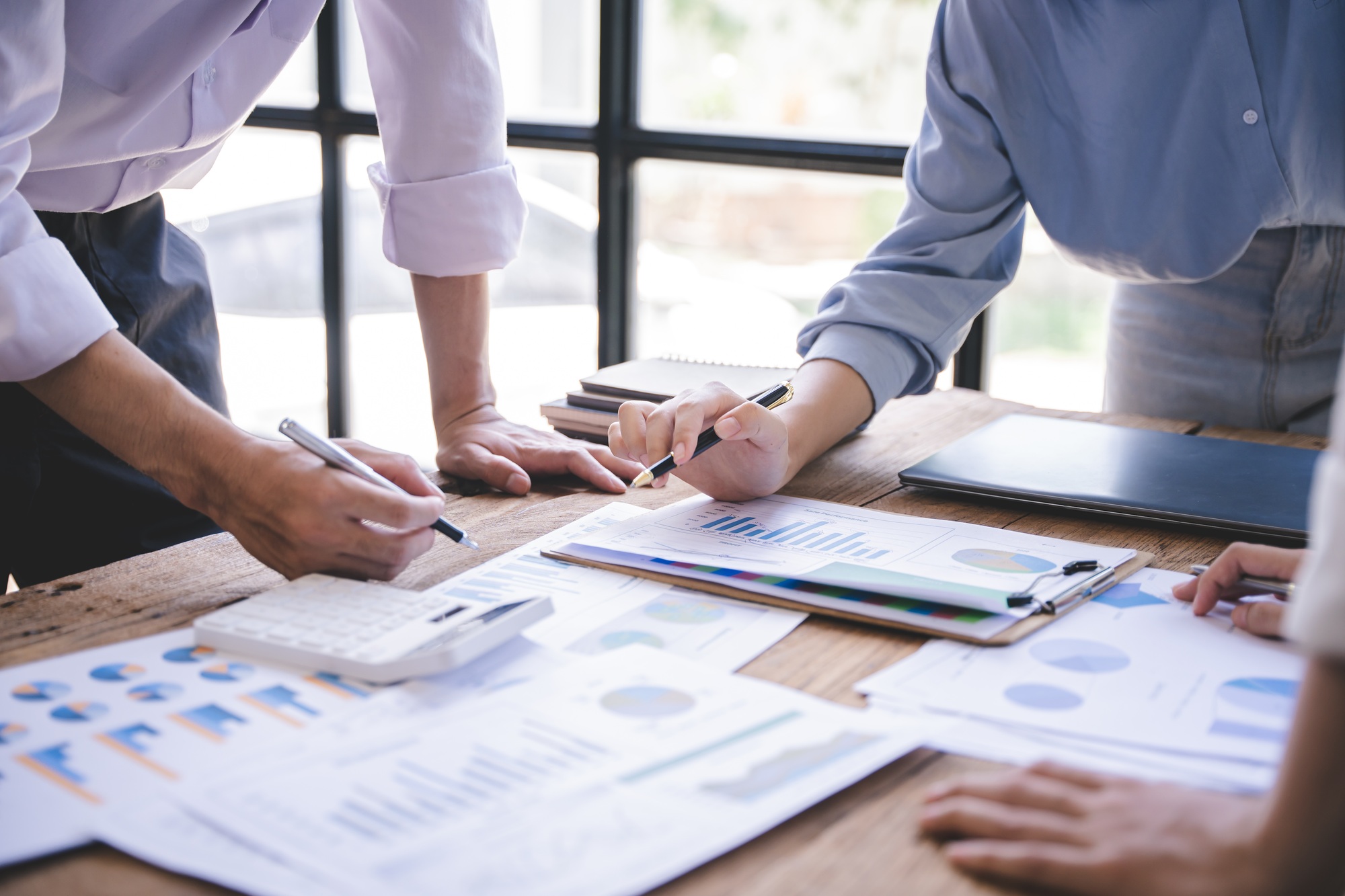 Business people meeting for business planning, brainstorming, accounting, tax and brokerage